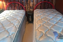 2 Twin Beds, Perfectly Clean  2 Twin Beds, Perfectly Clean Pillowtop mattresses, boxsprings and frames, 2 red metal headboards. All in excellent condition! $125 for whole package! !!SOLD!! _______________________