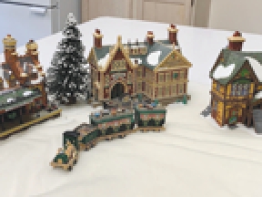 JUST IN TIME FOR YOUR  JUST IN TIME FOR YOUR CHRISTMAS INVENTORY! The Polson Flathead Lake Museum has 130 Heritage Village Collection items for sale including their Dickens Village, New England Village, The Original Snow Village and Christmas in the City Series. Donated to us 20+ years ago, these boxed items are new and ready for you! Prices for the lot are based on their 1996 suggested retail price, a significant discount to the purchaser. Call for a spreadsheet listing of the items for sale. (406) 249-1514