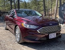 Great gas mileage!! 2017 Ford  Great gas mileage!! 2017 Ford Fusion SE 70,000 miles. Bought this car in Billings for my monthly trips to National Guard Drill in Fargo, ND when I was living in NE Montana. This is a single owner vehicle that I've always babied. Averaging 32mpg on the highway. Rare color - burgundy velvet, rear camera, digital display, brand new tires, and a lot of trunk/cargo space. $19,500. Please reach out with any and all questions: Call 406-480-1566